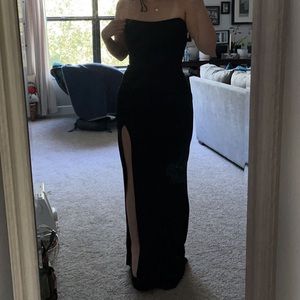 Black strapless dress left leg slit